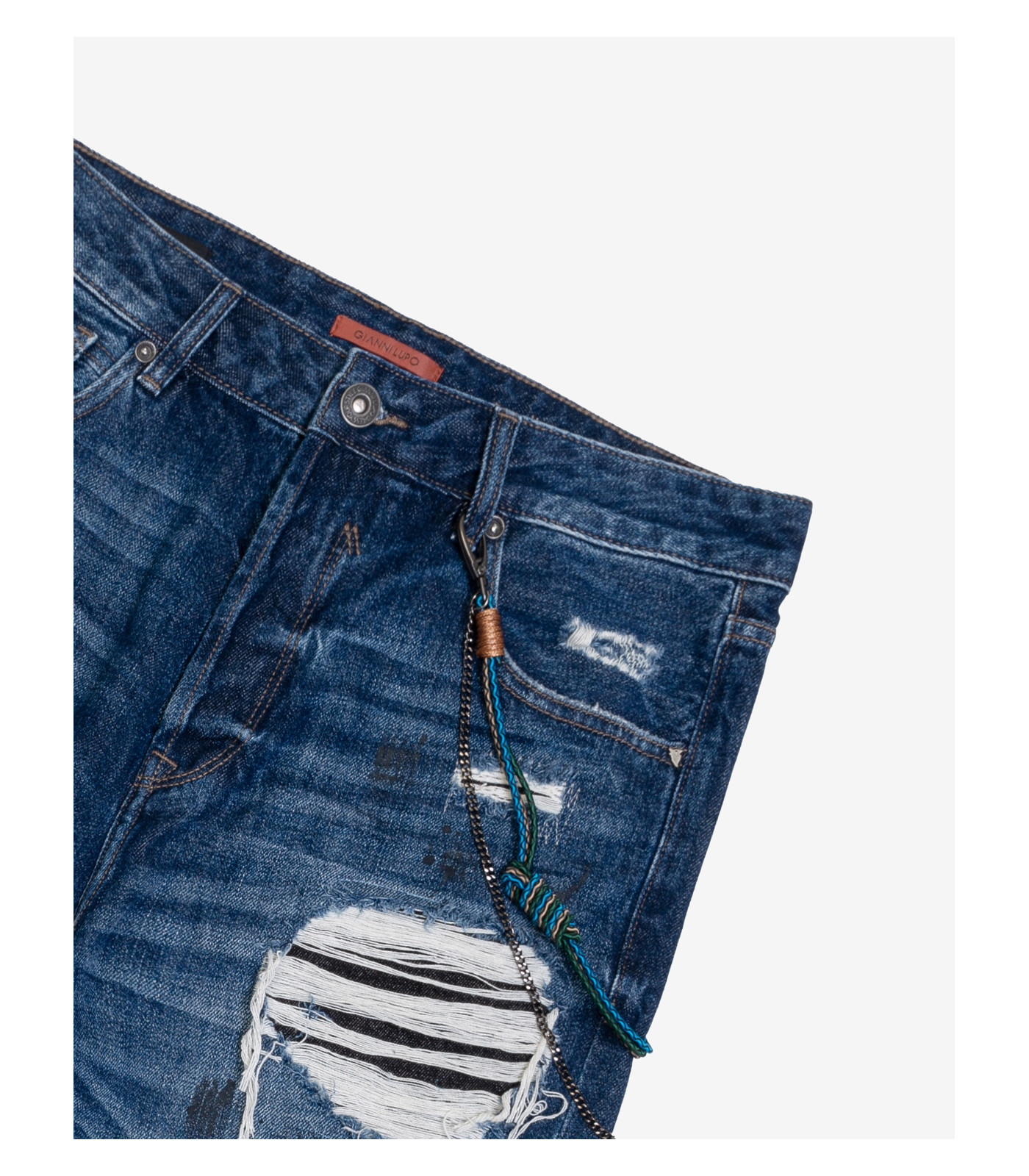 Mike carrot fit jeans with patches rips and paint droplets Gianni Lupo